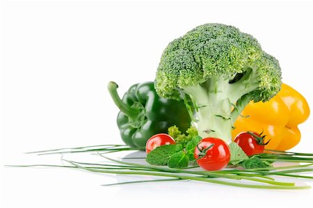 simsearch:400-05939266,k - cabbage broccoli with tomatos and green leaves isolated on white background Photographie de stock - Aubaine LD & Abonnement, Code: 400-04305858