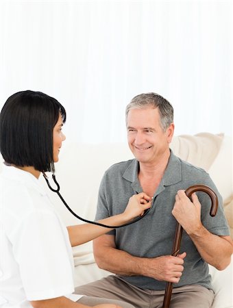 simsearch:400-04809124,k - Retired man with his nurse at home Stockbilder - Microstock & Abonnement, Bildnummer: 400-04306415