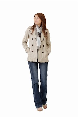 simsearch:400-04255435,k - Attractive Asian lady with coat walking on studio white background. Foto de stock - Super Valor sin royalties y Suscripción, Código: 400-04306466