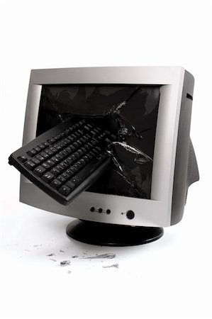 computer monitor with a keyboard inside the broken glass Stock Photo - Budget Royalty-Free & Subscription, Code: 400-04306569
