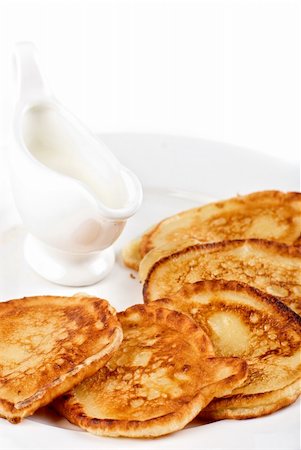 pancake bake - thick pancake with sauce on a white Stock Photo - Budget Royalty-Free & Subscription, Code: 400-04307428