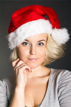simsearch:400-06477682,k - A smiling young girl with a Christmas hat Stock Photo - Budget Royalty-Free & Subscription, Code: 400-04307621