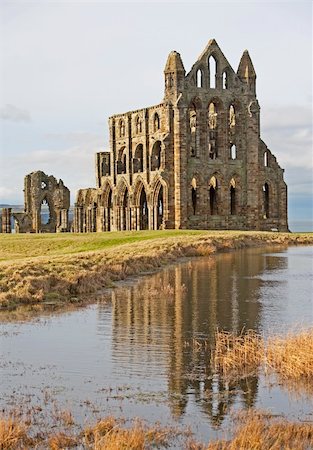 Remains of an ancient english abbey with a reflection in water Stockbilder - Microstock & Abonnement, Bildnummer: 400-04308906