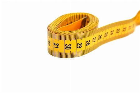 simsearch:400-05292979,k - Yellow measuretape isolated on white background. Photographie de stock - Aubaine LD & Abonnement, Code: 400-04309143