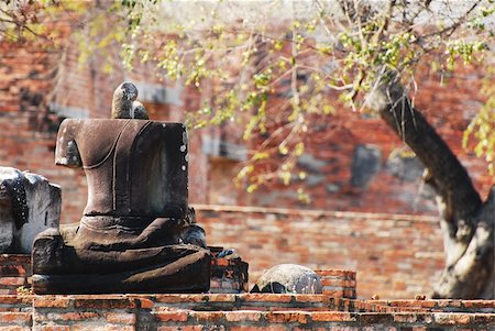 Buddha statues damaged in Ayutthaya Fotografie stock - Microstock e Abbonamento, Codice: 400-04309370