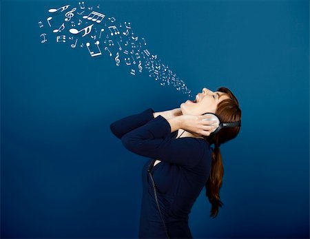 portrait screaming girl - Young woman singing and listen music with musical notes getting out of her mouth Stock Photo - Budget Royalty-Free & Subscription, Code: 400-04309503