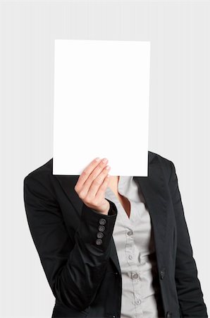 simsearch:400-05718227,k - Woman showing a blank paper sheet in front of her head Stock Photo - Budget Royalty-Free & Subscription, Code: 400-04309544