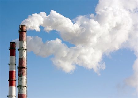 Two smoking towers against the pure blue sky. Fotografie stock - Microstock e Abbonamento, Codice: 400-04309631