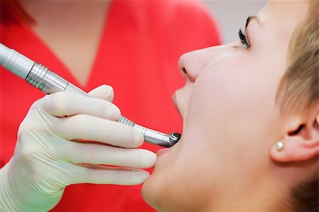 simsearch:400-04340930,k - Image of young lady with dentist over her checking oral cavity Foto de stock - Super Valor sin royalties y Suscripción, Código: 400-04309650