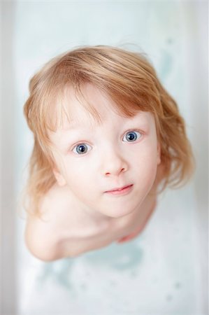 boy with long blong hair standing in bathtub looking up Stock Photo - Budget Royalty-Free & Subscription, Code: 400-04309726