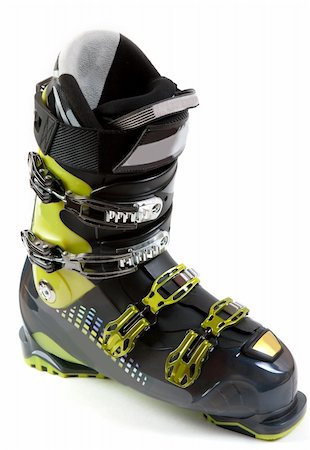 simsearch:400-04259396,k - New ski shoe in metallic earring on white background Fotografie stock - Microstock e Abbonamento, Codice: 400-04300351