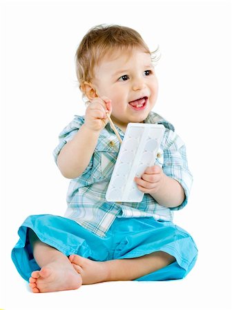 Beautiful baby with paint brush.   Isolated. Fotografie stock - Microstock e Abbonamento, Codice: 400-04300633