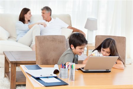 simsearch:400-04044108,k - Children working on their laptop at home Stock Photo - Budget Royalty-Free & Subscription, Code: 400-04300942