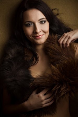 simsearch:400-05185838,k - smile attractive glamor girl with brown boa Stock Photo - Budget Royalty-Free & Subscription, Code: 400-04301030