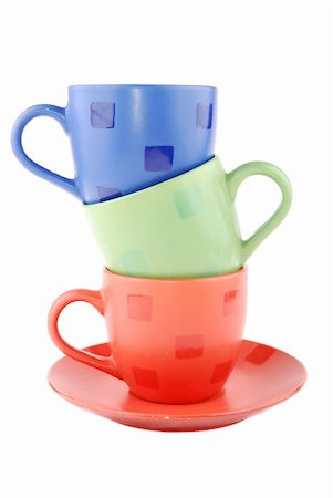 ergonom (artist) - Multi-coloured cups on a support on a white background Foto de stock - Royalty-Free Super Valor e Assinatura, Número: 400-04301205