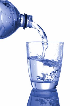 pour of liquor - ice water pouring in transparent glass or cup Photographie de stock - Aubaine LD & Abonnement, Code: 400-04301352