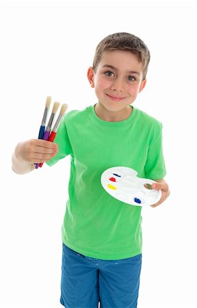 school boy in shorts - A young boy holding three paintbrushes and an artist palette with acrylic paints.  White Background. Stock Photo - Budget Royalty-Free & Subscription, Code: 400-04301409
