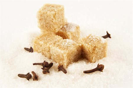 refined sugar - Spicinesses, pieces of brown sugar and crystals of white sugar Stock Photo - Budget Royalty-Free & Subscription, Code: 400-04301444