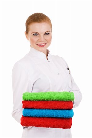 Red hair woman holding color towels Stock Photo - Budget Royalty-Free & Subscription, Code: 400-04302231