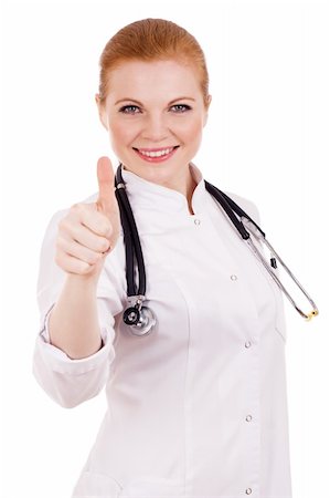 Smiling female doctor showing thumb up Stock Photo - Budget Royalty-Free & Subscription, Code: 400-04302233