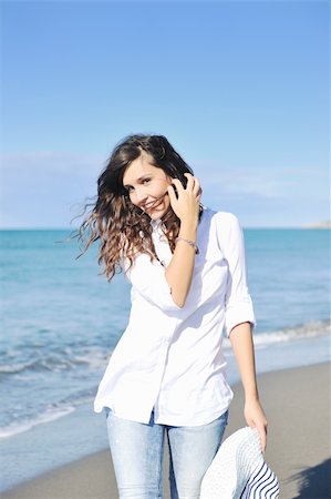 swimsuit model white background - happy young woman relax on beautiful  beach at morning Stock Photo - Budget Royalty-Free & Subscription, Code: 400-04302648