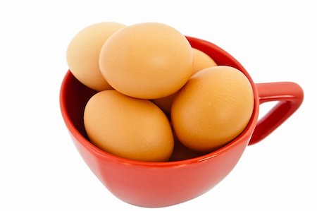 simsearch:400-06640932,k - brown eggs in red bowl on white background Stock Photo - Budget Royalty-Free & Subscription, Code: 400-04302961