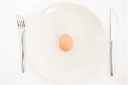 simsearch:400-04313912,k - top view of one egg on white plate Stockbilder - Microstock & Abonnement, Bildnummer: 400-04302963