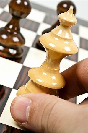 simsearch:400-06200872,k - Chess pieces closeup on chessboard Stock Photo - Budget Royalty-Free & Subscription, Code: 400-04303167