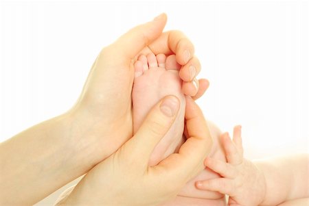 simsearch:400-04235194,k - newborn baby feet isolated on white Stock Photo - Budget Royalty-Free & Subscription, Code: 400-04303172