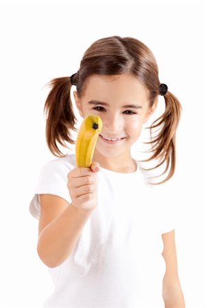 Little girl isolated on white pretending is shoot with a banana Stock Photo - Budget Royalty-Free & Subscription, Code: 400-04303419