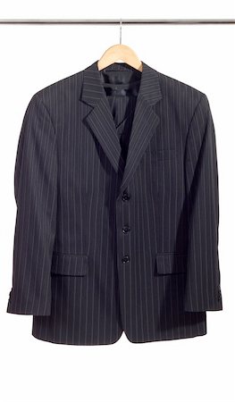 dresses closet - Men's suit on the rack, isolated on white Photographie de stock - Aubaine LD & Abonnement, Code: 400-04303537