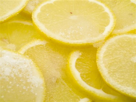 Many the segments of a lemon cut by an oval it is possible to use as a background Stockbilder - Microstock & Abonnement, Bildnummer: 400-04303532