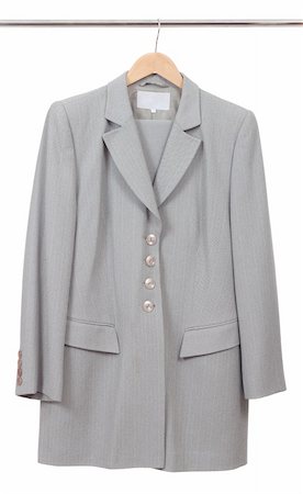 dresses closet - Women's suit isolated on the white Photographie de stock - Aubaine LD & Abonnement, Code: 400-04303540
