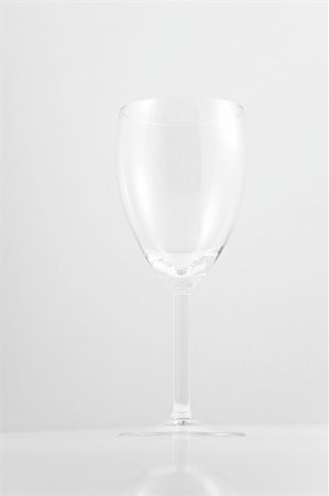 simsearch:6118-07439829,k - Empty white wine glass on white background Stock Photo - Budget Royalty-Free & Subscription, Code: 400-04303579