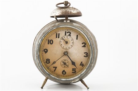 old alarm-clock with bell on white background Foto de stock - Super Valor sin royalties y Suscripción, Código: 400-04303580