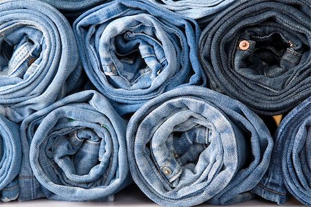 simsearch:400-04473469,k - roll blue denim jeans arranged in stack Stock Photo - Budget Royalty-Free & Subscription, Code: 400-04303741