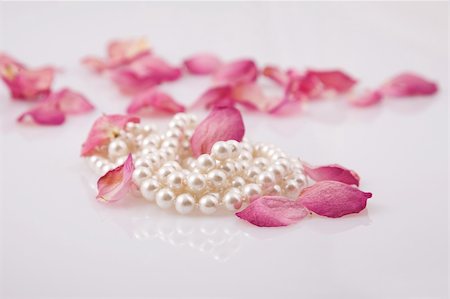 petal on stone - fine pearl beads and red roses petals Stock Photo - Budget Royalty-Free & Subscription, Code: 400-04303821