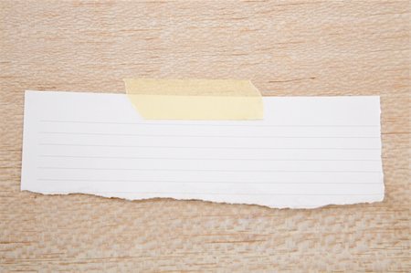Torn Paper and yellow masking tape on wood texture Stock Photo - Budget Royalty-Free & Subscription, Code: 400-04303831
