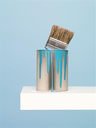 pouring paint - Paintcan and brush on blue background Stock Photo - Budget Royalty-Free & Subscription, Code: 400-04303972