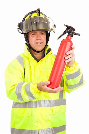 simsearch:400-06392786,k - Fire fighter demonstrating how to use a fire extinguisher.  Isolated on white. Fotografie stock - Microstock e Abbonamento, Codice: 400-04314171