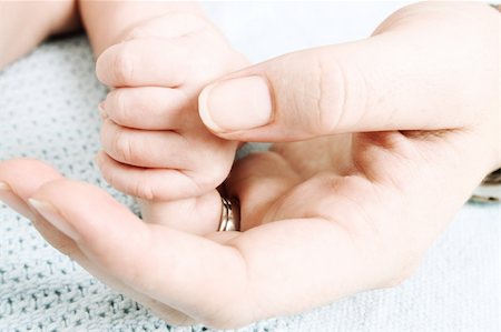 simsearch:400-04235194,k - Hand of a baby in his mothers hand Stock Photo - Budget Royalty-Free & Subscription, Code: 400-04314531