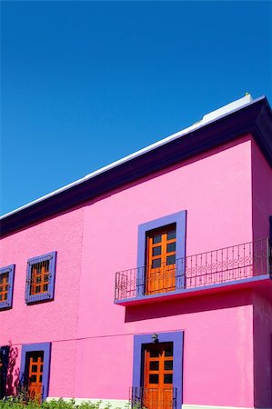 Mexican pink house facade detail wooden doors Stock Photo - Budget Royalty-Free & Subscription, Code: 400-04315004