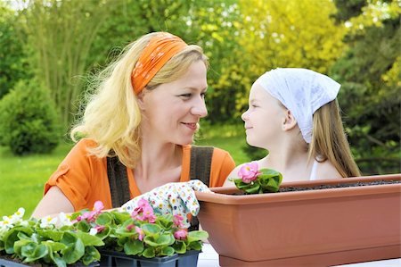 Mother and daughter having gardening time Stock Photo - Budget Royalty-Free & Subscription, Code: 400-04315599