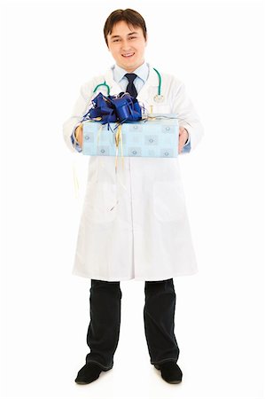 simsearch:400-04351236,k - Smiling medical doctor holding present in hands  isolated on white Stock Photo - Budget Royalty-Free & Subscription, Code: 400-04316018