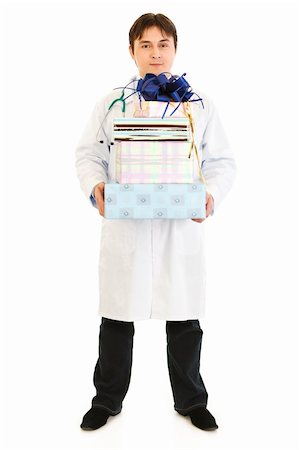 simsearch:400-04351236,k - Smiling medical doctor holding gifts in hands  isolated on white Stock Photo - Budget Royalty-Free & Subscription, Code: 400-04316019