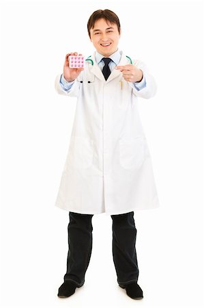simsearch:400-04880039,k - Smiling  medical doctor pointing finger on pack of pills isolated on white Foto de stock - Super Valor sin royalties y Suscripción, Código: 400-04316012