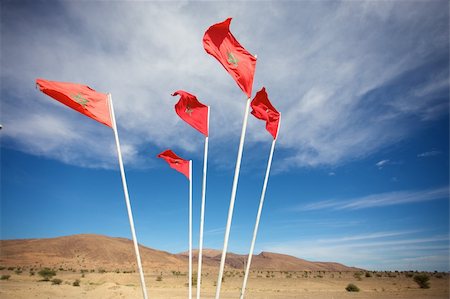 Moroccan flags in the south of Agadir Foto de stock - Super Valor sin royalties y Suscripción, Código: 400-04316208