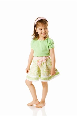 simsearch:400-04850794,k - Cheerful girl dancing on floor isolated on white Stock Photo - Budget Royalty-Free & Subscription, Code: 400-04316782