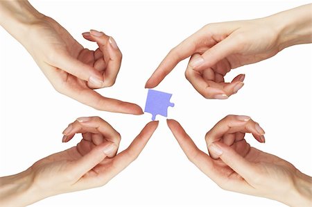 simsearch:640-01355058,k - Woman hands with puzzle isolated on white background Photographie de stock - Aubaine LD & Abonnement, Code: 400-04317165