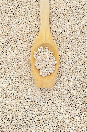 Wooden spoon and dried pearled barley Stock Photo - Budget Royalty-Free & Subscription, Code: 400-04317341